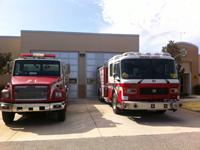 2 fire trucks in front of Station 21