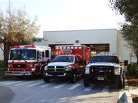 Fire truck, ambulance and fire rescue vehicle in front of Station 47