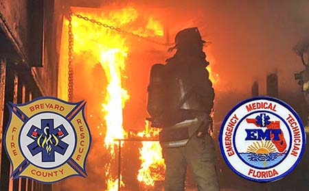 Firefighter observing a burning building.