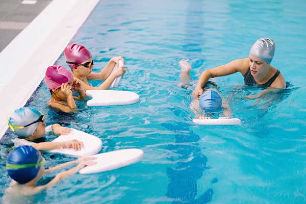 lessons Children learning to swim.