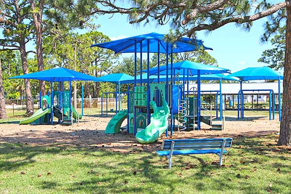 Playground with multiple play areas Playground with multiple play areas
