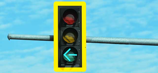 Traffic light with green arrow illuminated.