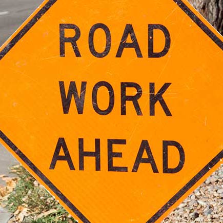 Road work ahead sign.