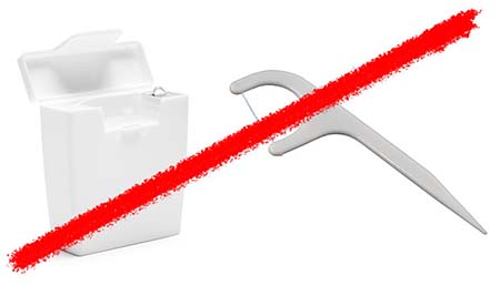 Line striking through container of dental floss and dental floss tool
