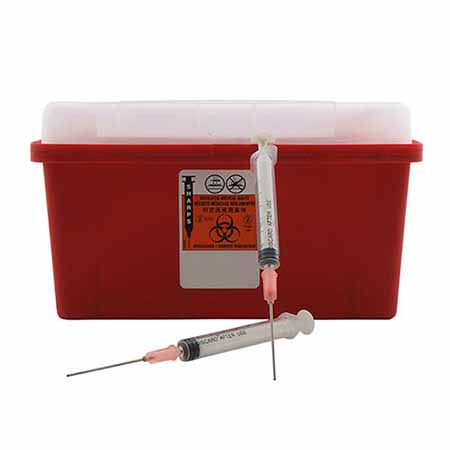 Sharps box with 2 needles.