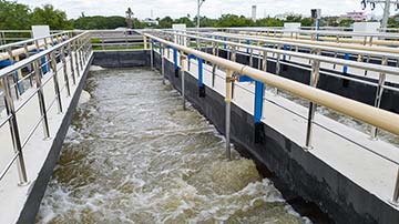 Top view of wastewater treatment facility open tank.